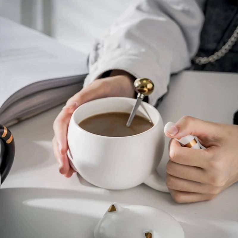 Unique Black Cat Mug with a playful cat-inspired motif.