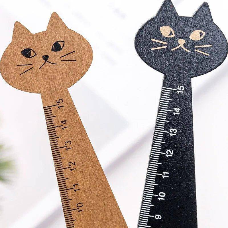 Add a whimsical touch to your stationery collection with the functional and adorable Wooden Cat Ruler