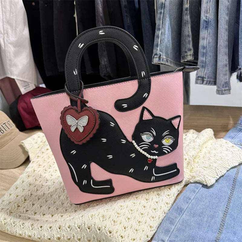 The Feline Fancy Cat Bag combines luxury and whimsy, perfect for cat lovers who appreciate fine design