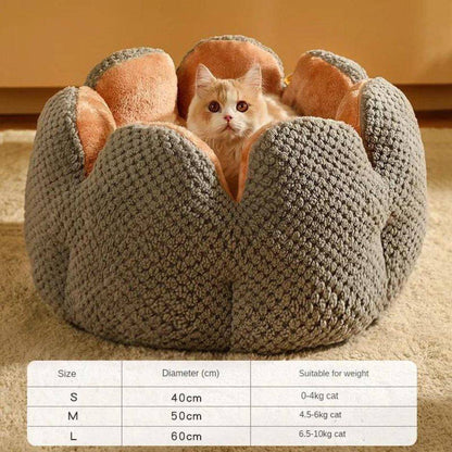 Perfect for kittens or smaller breeds, the Small Cat Bed offers a snug, safe environment for your cat to rest and unwind