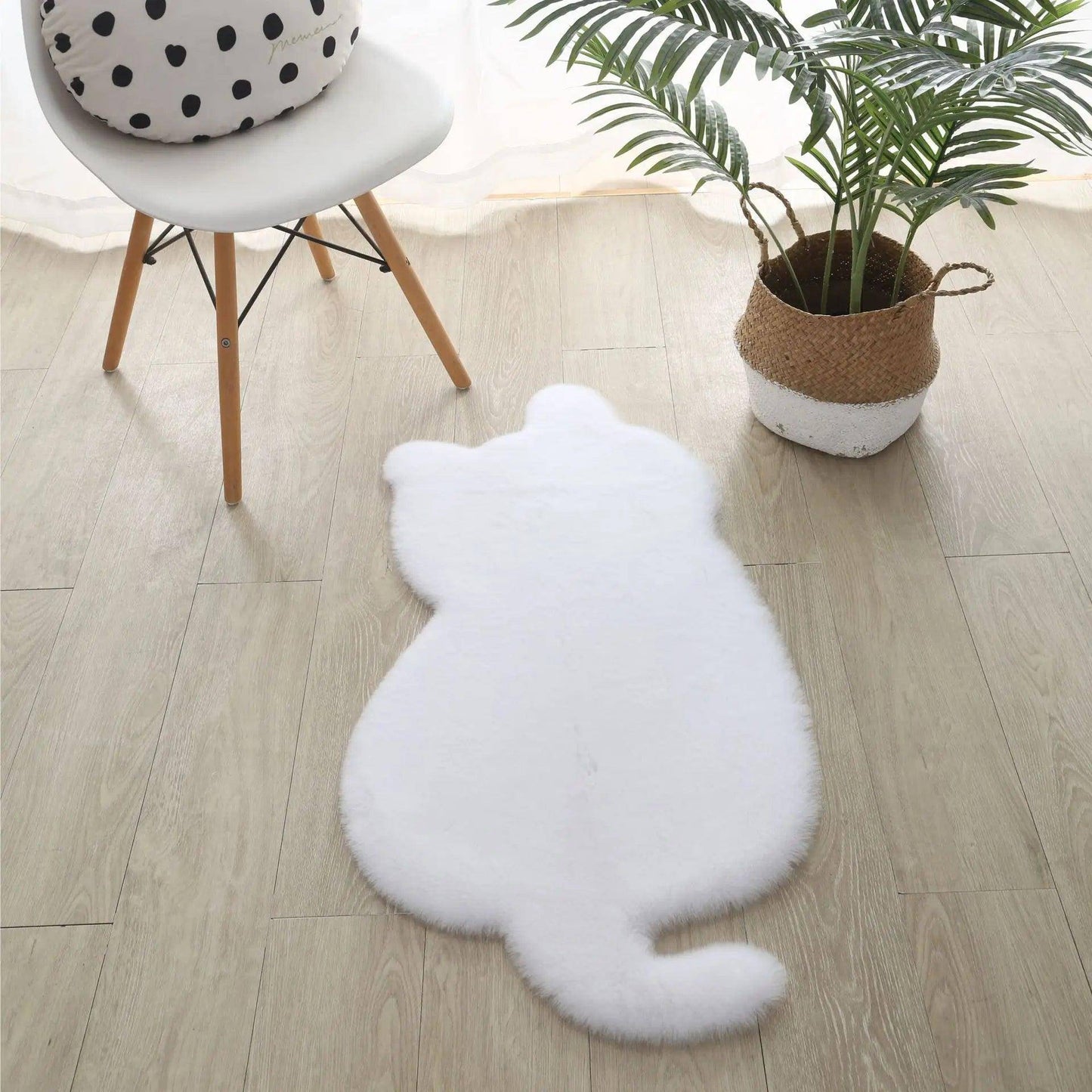 Add a plush, cuddly touch to your décor with the adorable and soft Plush Cat Rug