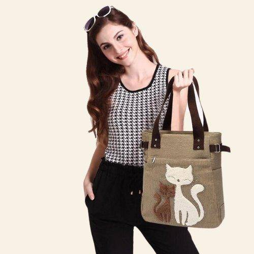 The Soulmates Cat Bag combines elegant feline imagery with a sentimental, heartwarming message