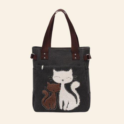 Add a warm, loving touch to your wardrobe with the Soulmates Cat Bag, a must-have for cat enthusiasts