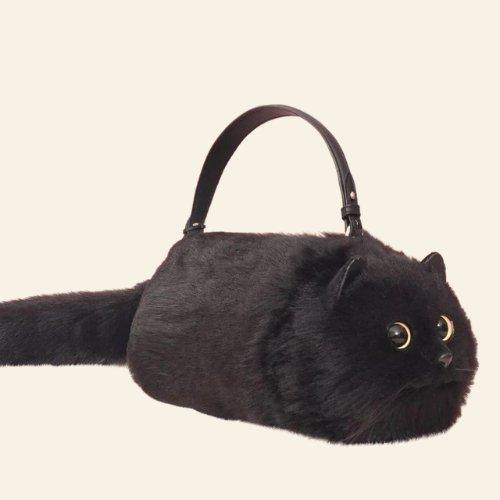 Show your love for cats with the unique and fun Felix Cat Bag, perfect for any cat enthusiast