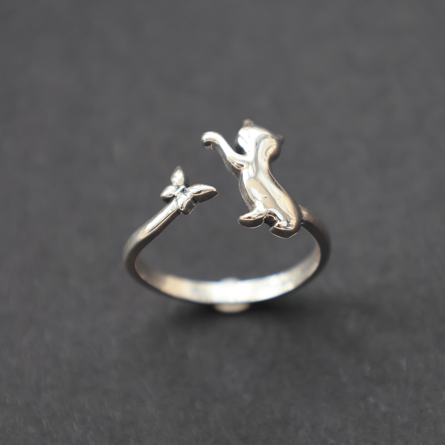 The Flutter Cat Ring captures the essence of feline grace with a light and airy feel