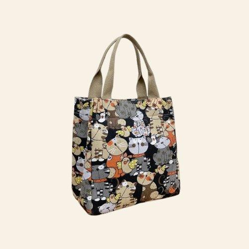 Cute Cat Tote Bag featuring an adorable cat design, perfect for adding charm to your everyday look