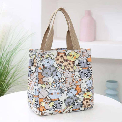 Add a fun and functional accessory to your collection with the Cute Cat Tote Bag