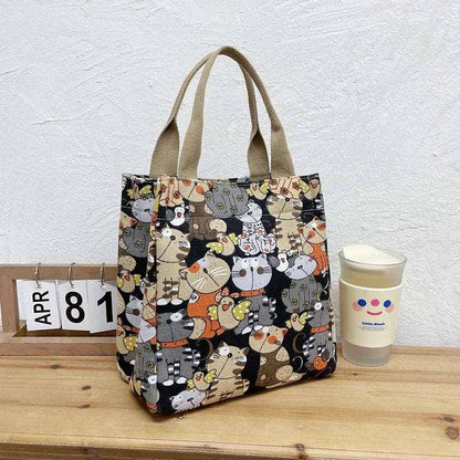 This Cute Cat Tote Bag is a must-have for cat enthusiasts who enjoy both fashion and practicality