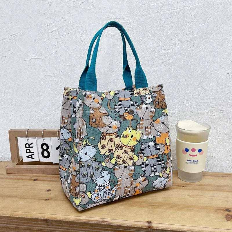 Designed to hold everything you need, the Cute Cat Tote Bag is as functional as it is cute