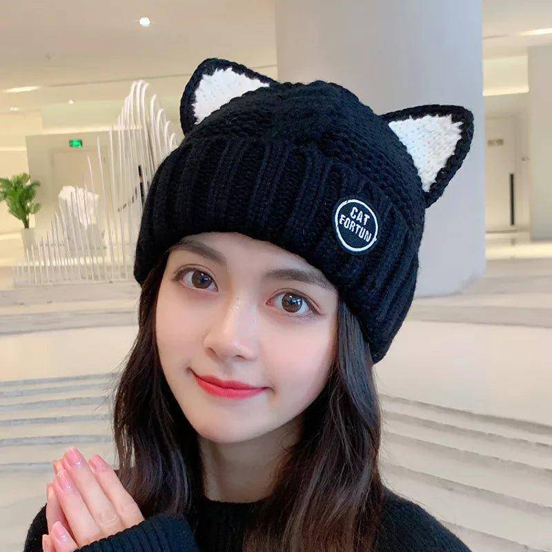 Add a fun and cozy element to your outfit with the charming and stylish Cat Ears Beanie