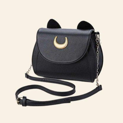 Ideal for adding a cosmic and feline-inspired twist to your daily style, the Cat Moon Bag is both functional and fun