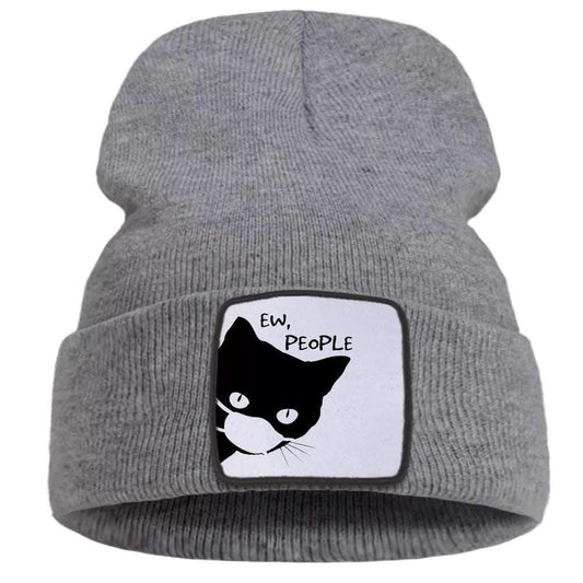 Cat Print Beanie featuring a fun and playful design with a bold cat print, perfect for adding personality to your winter wardrobe