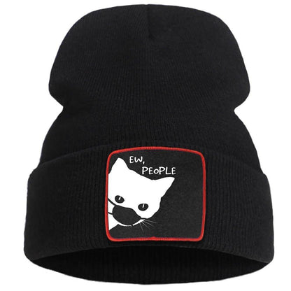 Add a quirky touch to your cold-weather outfits with the cute and cozy Cat Print Beanie