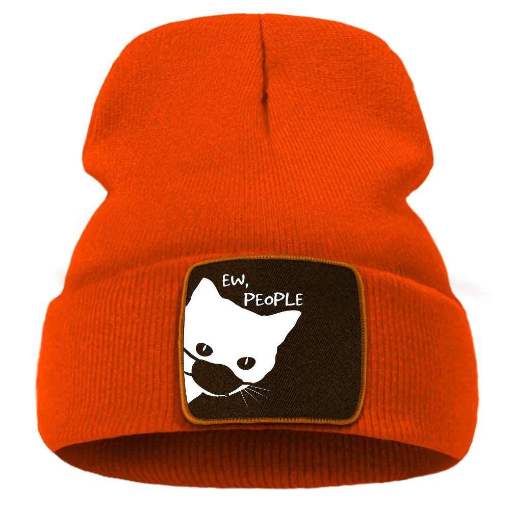 Perfect for layering over a scarf or jacket, the Cat Print Beanie is a stylish accessory that keeps you warm