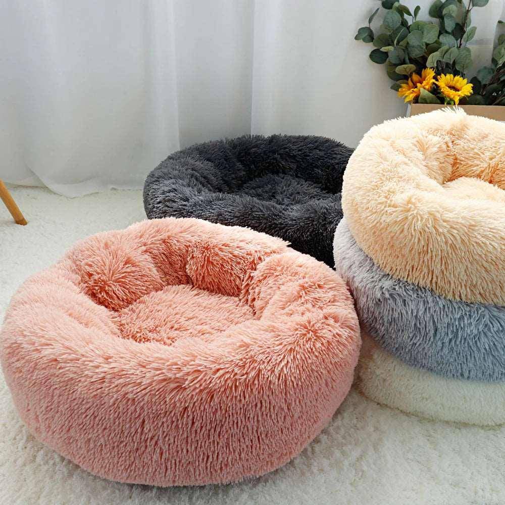 Add comfort and security to your cat’s resting space with the plush and comfortable Cat Donut Bed