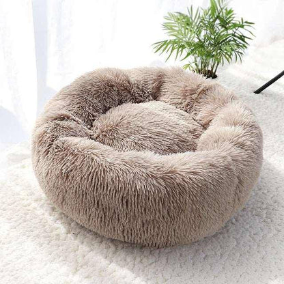 Cat Donut Bed designed to mimic the comfort of a mother’s embrace, making it ideal for cats who love to nest and snuggle