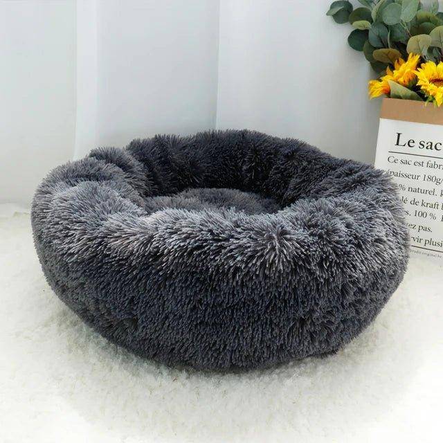 Show your love for your feline friend with the Cat Donut Bed, providing them with a cozy, calming retreat