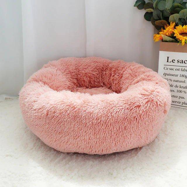 Designed for ultimate comfort, the Cat Donut Bed features plush, fluffy fabric that’s perfect for cold days or naps