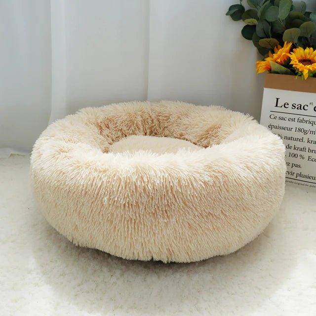 The Cat Donut Bed offers both comfort and style, with a design that complements modern home décor while providing your cat with a cozy spot to relax